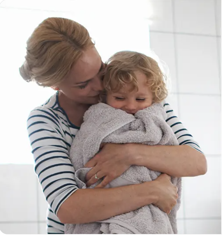 Woman and child with space heater